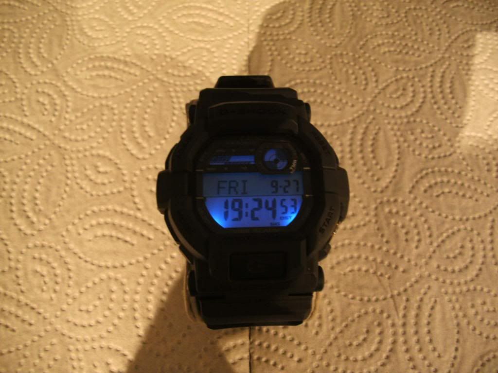 digital watch with red digits